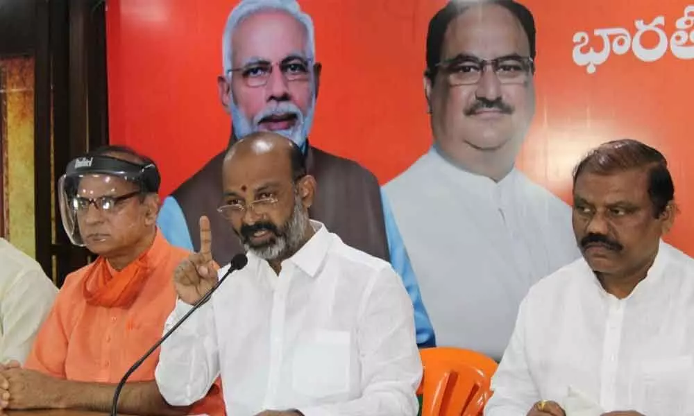 TS BJP president Bandi Sanjay Kumar addressing the media in Hyderabad on Monday