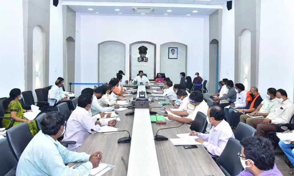 East Godavari Collector D Muralidhar Reddy addressing a review meeting with officials in Kakinada on Monday