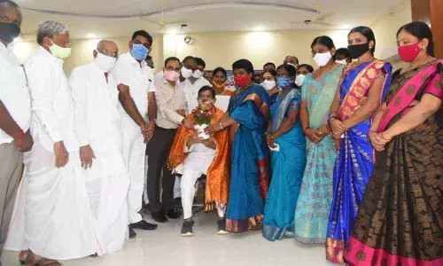 ZP members felicitating DCCB Chairman K Ravinder Rao at a general body meeting at ZPP office in Karimnagar on Monday