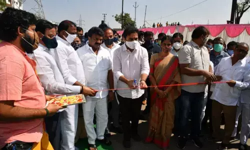 KTR inaugurating a link road between Road No 45 to Old Bombay road at Nandi Hills on Monday