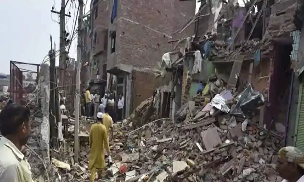 A 22-year-old labourer was killed after an old building collapsed in West Delhis Trinagar area, police said on Tuesday.