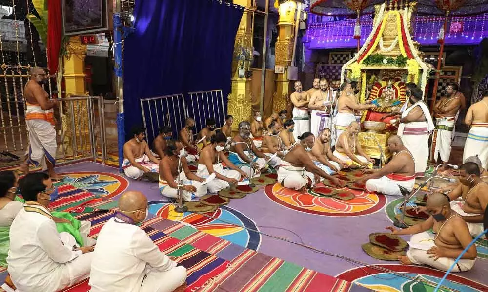 Priests performing Laksha Kumkumarchana to Goddess Padmavathi at Tiruchanoor on Tuesday