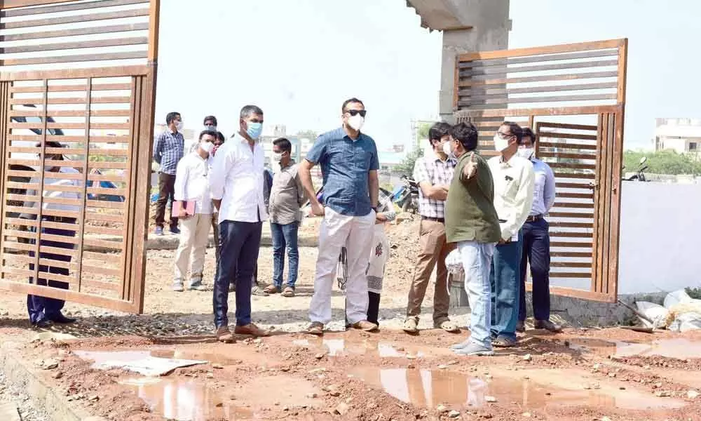 District Collector RV Karnan inspecting development works in Khammam on Tuesday