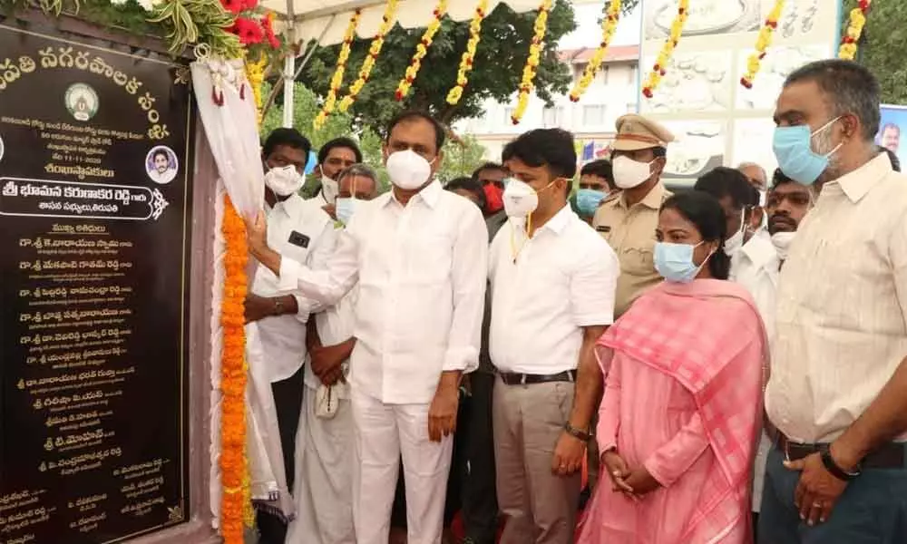 MLA Bhumana Karunakar Reddy laying foundation stone for construction of 60-feet road from Karakambadi road to Renigunta road via Kottapalli, in Tirupati on Wednesday