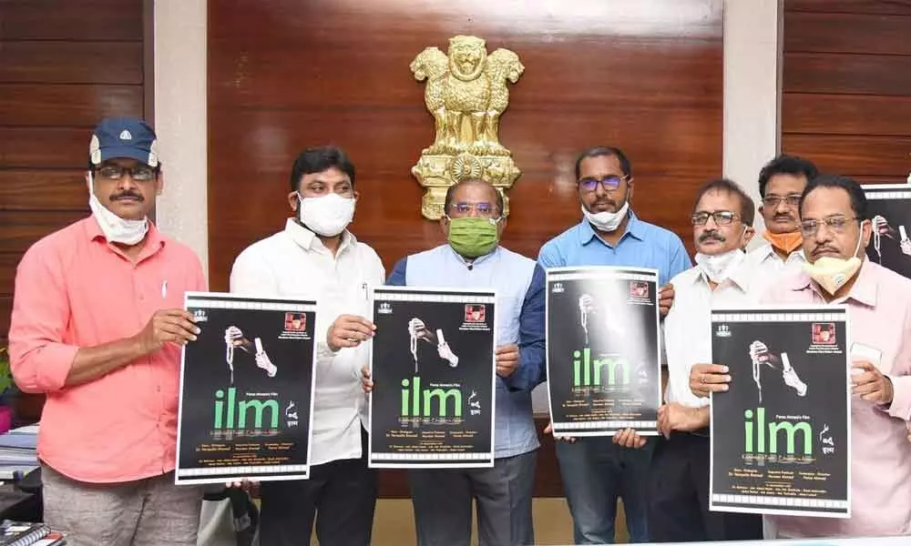 Krishna district Collector Md Imtiaz releasing wallposter on short film ‘Education’ at the camp office in Vijayawada on Wednesday