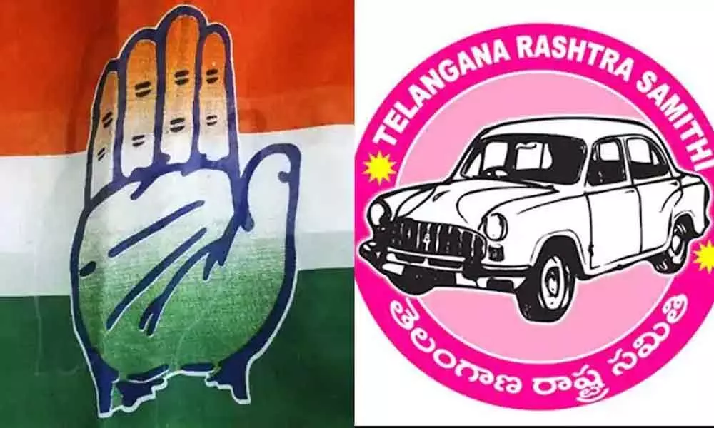 Scuffle between Congress, TRS leaders over victims of house damage