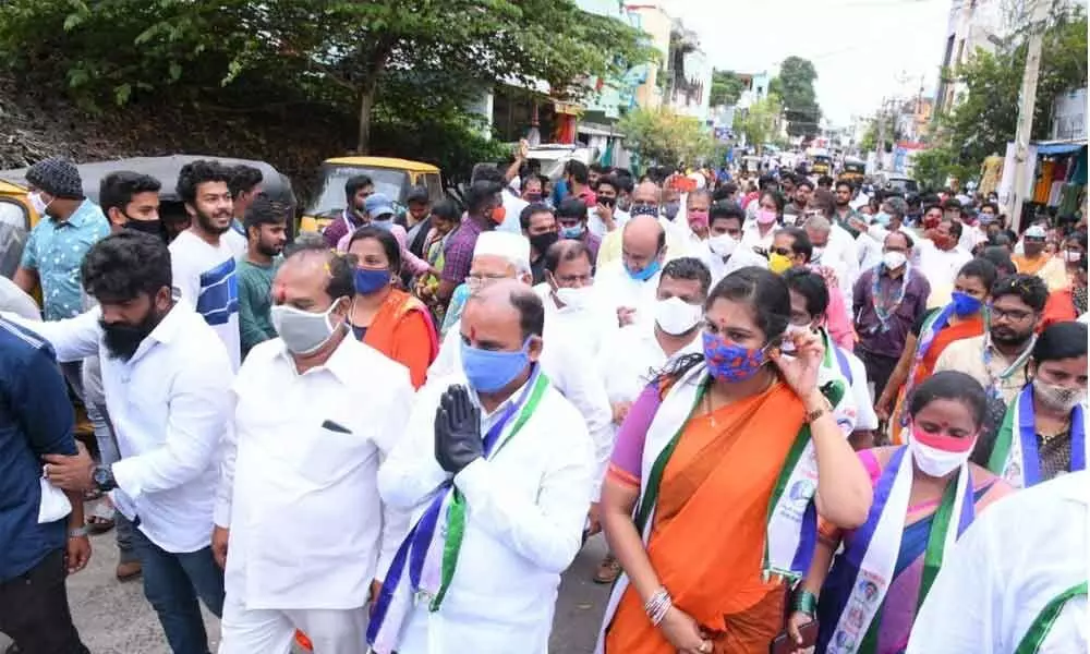 YSRCP city coordinator S Sivarama Subramanyam participating in Padayatra in Rajamahendravaram on Thursday