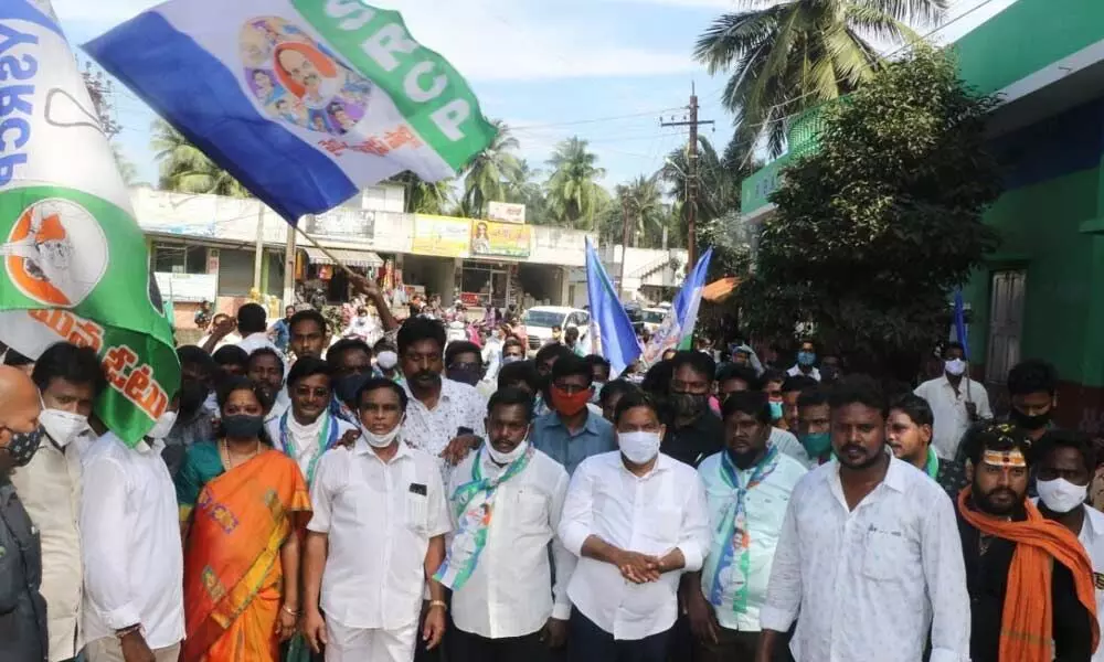 Minister P Viswaroop and MP Chinta Anuradha participating in Padayatra in Guddivanichinta village on Friday