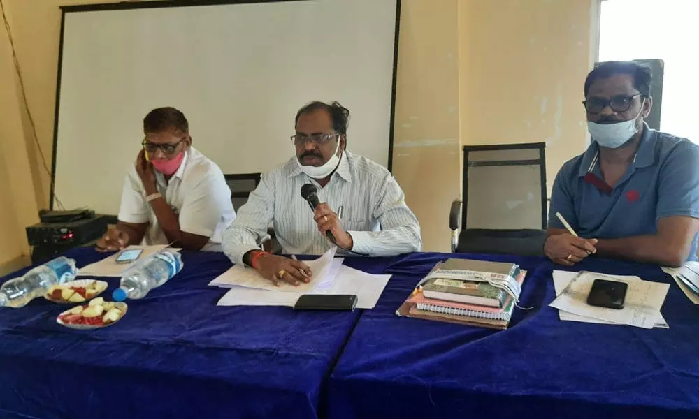 Divisional Panchayat Officer Jana Satyanarayana reviewing tax collections with panchayat secretaries in Korukonda onFriday