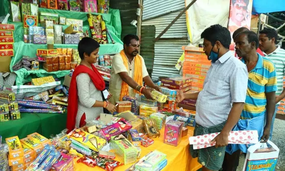 A vendor selling firecrackers in Tirupati