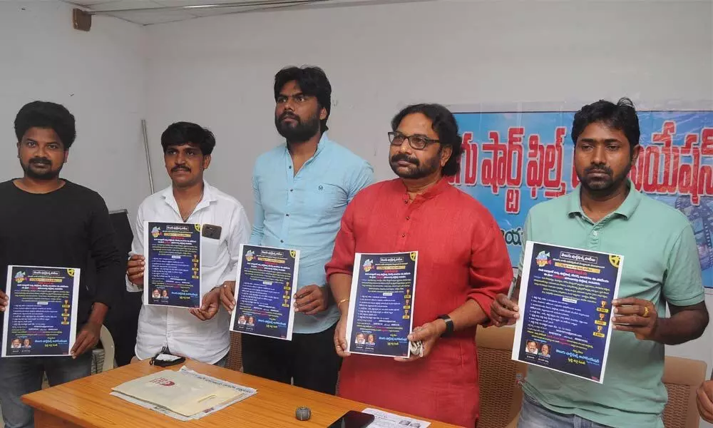 Telugu Short Film Association (TSFA) representatives releasing brochure of short film competition in Vijayawada on Sunday