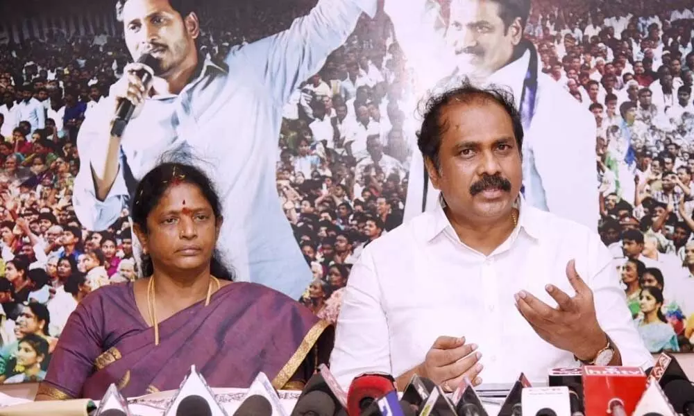 Agriculture Minister Kurasala Kannababu addressing the media along with MP Vanga Geetha in Kakinada on Sunday