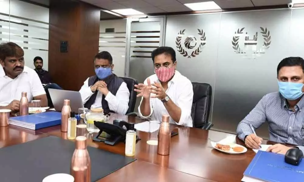 Municipal Administration Minister KT Rama Rao holding a review meeting with the Irrigation, Water Board, HMDA, Revenue officials at GHMC office in Hyderabad on Sunday