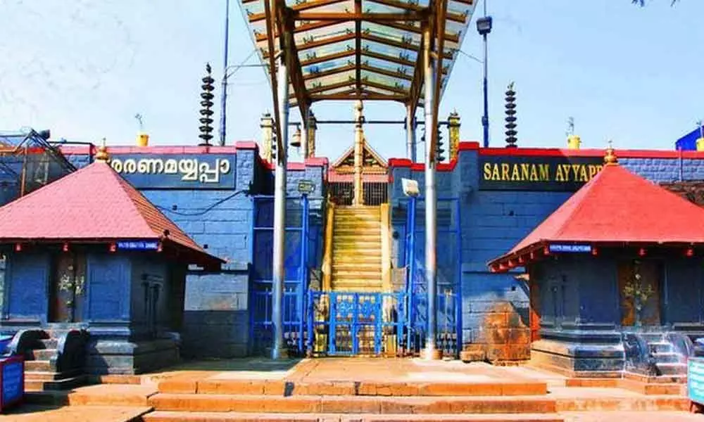 With masks on devotees trek Sabarimala, pray at Lord Ayyappa temple