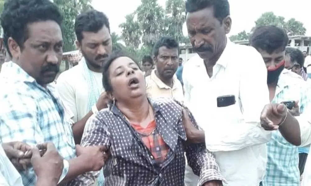 Woman farmer Tummala Jyothi, who attempted suicide by consuming pesticide at Palair on Monday