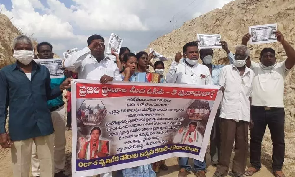 OCP 5 opposition committee members halting the works at the fifth open cast mine in Godavarikhani on Monday