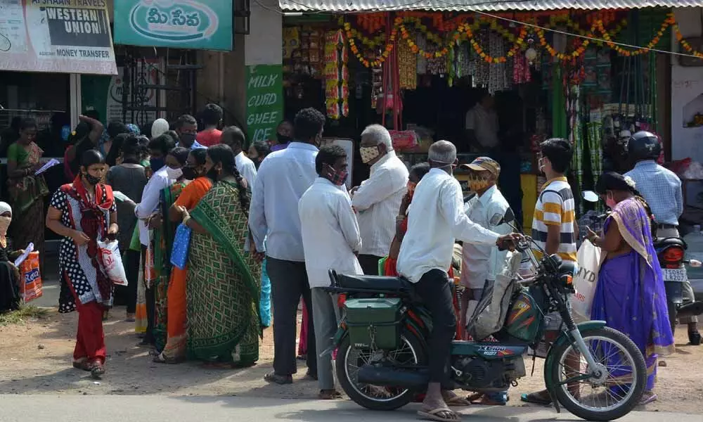 Flood-hit people flood MeeSeva for Rs 10k aid