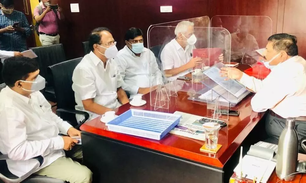 TRS leaders led by Telangana Planning Board vice chairman B Vinod Kumar submitted a memorandum to State Election Commissioner C Parthasarathi in Hyderabad on Monday