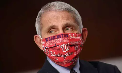 Dont abandon masks, social distancing after getting vaccine: Fauci