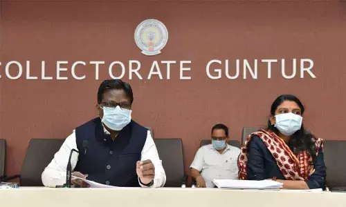 Guntur District Collector I Samuel Anand Kumar addressing a review meeting in Guntur on Monday