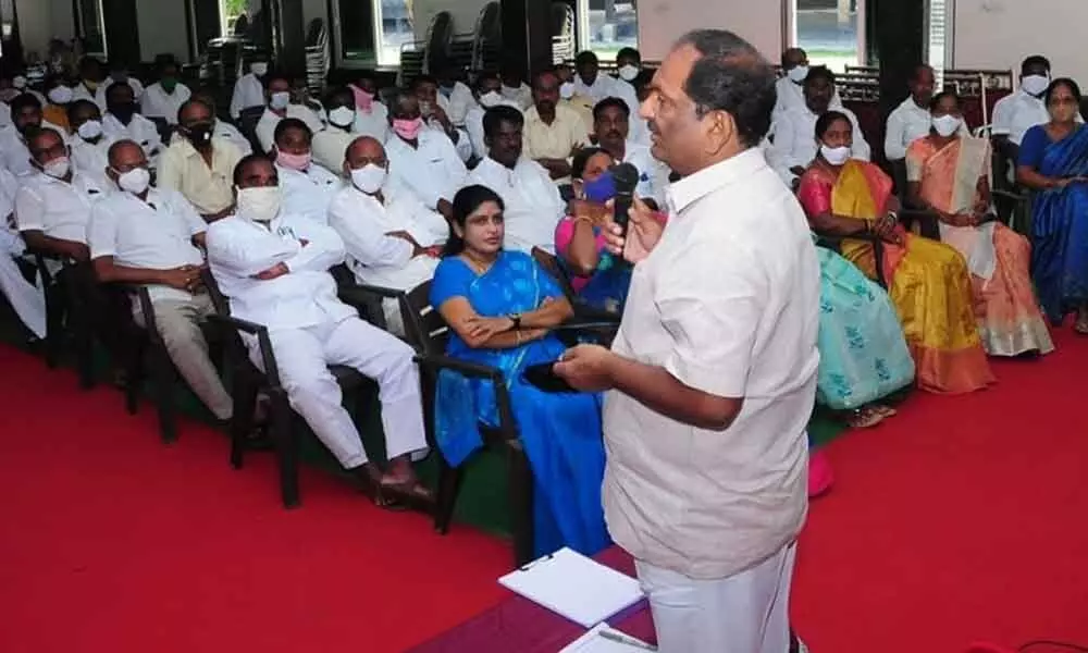 Welfare Minister Koppula Eshwar addressing the TRS leaders and cadre at a preparatory meeting of GHMC elections in Karimnagar