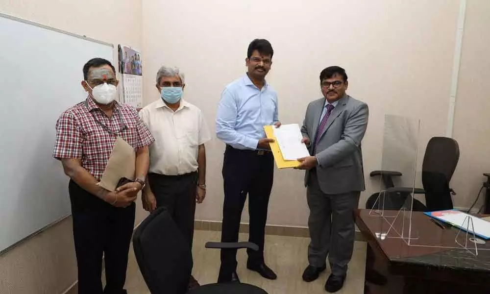 SV Kota Reddy taking charge as the new Vice-Chancellor of the VIT-AP University in the presence of GV Selvam, Vice President, VIT University