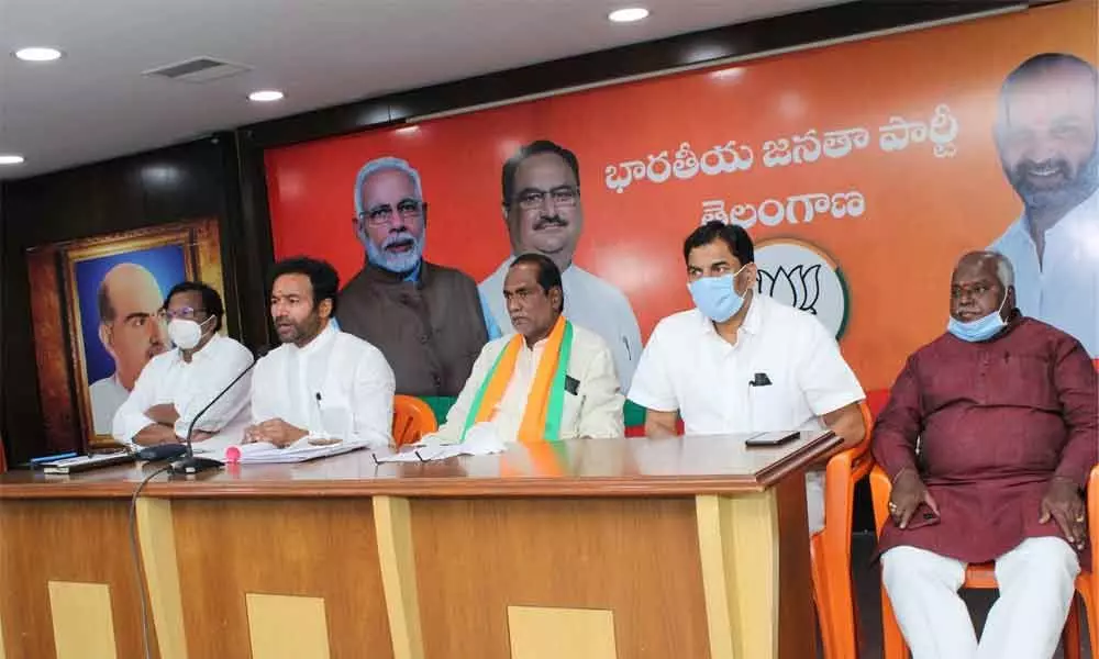 Union Minister of State for Home Affairs G Kishan Reddy along with BJP National OBC Morcha president Dr K Laxman addressing the media in Hyderabad on Tuesday