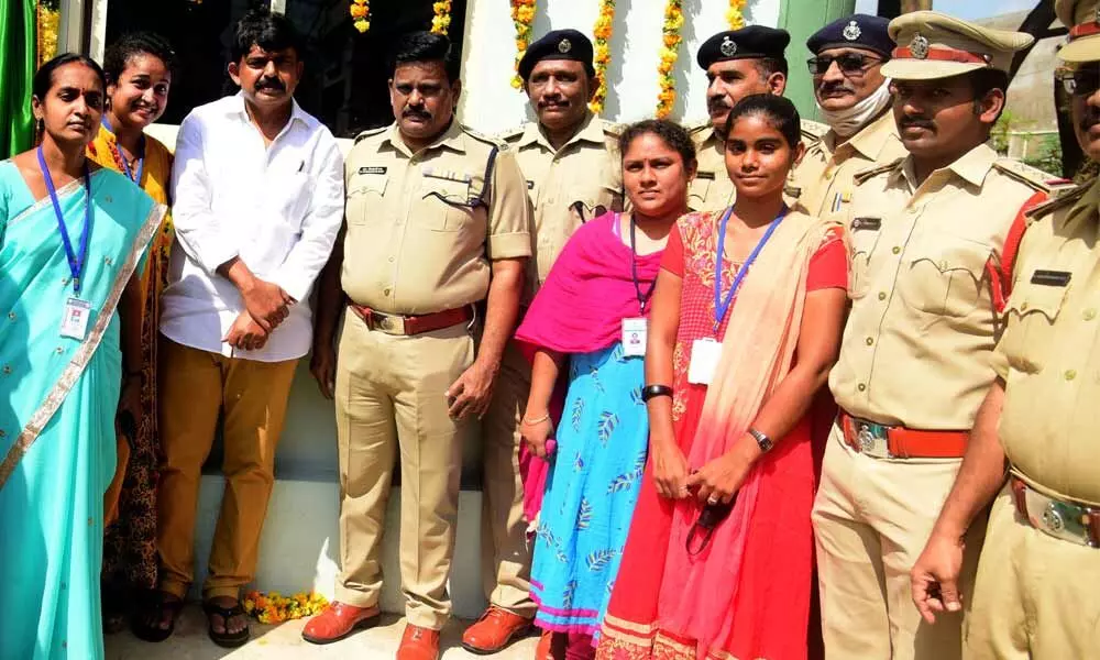 Minister Perni Nani and SP M Ravindranath Babu at Robertson Police Station in Machilipatnam on Wednesday