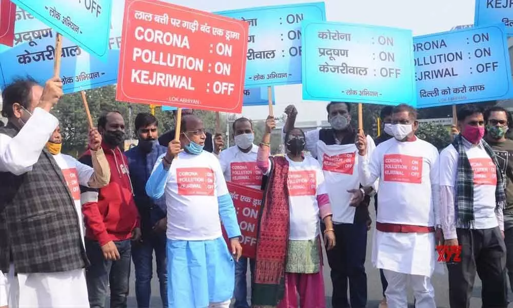 BJP protests against Kejriwal for failing to curb Covid, pollution