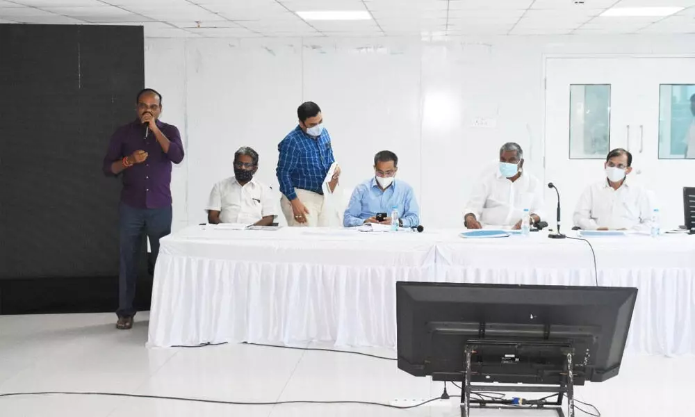 Minister Peddireddi Ramachandra Reddy addressing the review meeting with the district level officials on Thursday