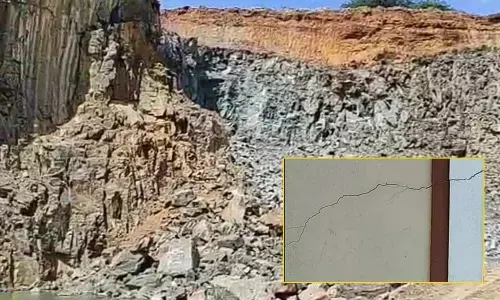 The site of the explosion at Ravvala Konda mining zone in Kurnool district on Thursday. (Inset)  The portion of a house which developed cracks due to the high intensity explosion.