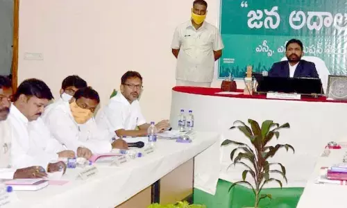 SC/ST Commission Chairman E Srinivas conducting Jan Adalat in Khammam on Friday