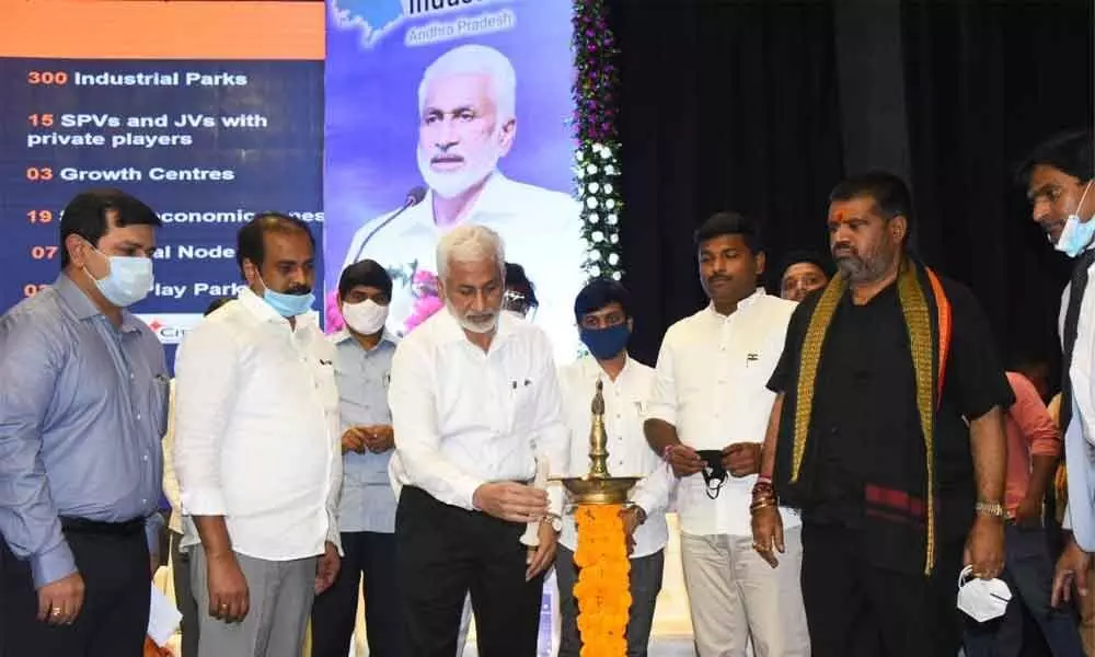 Rajya Sabha MP V Vijayasai Reddy, Tourism Minister M Srinivasa Rao and Agriculture Minister K Kannababu along with others inaugurating the industrial meet in Visakhapatnam on Saturday