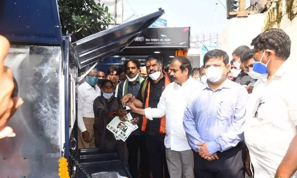 Agriculture Minister K Kannababu, Tourism Minister M Srinivasa Rao, District Collector V Vinay Chand along with others inaugurating F.I.S.H. kiosk in Visakhapatnam on Saturday