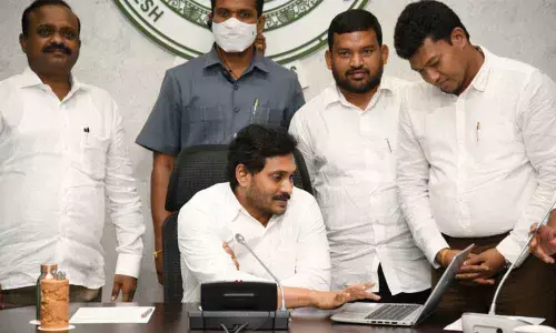 Chief Minister Y S Jagan Mohan Reddy laying foundation stones for 4 fishing harbours and 25 aqua hubs in virtual mode from his camp office in Tadepalli on Saturday