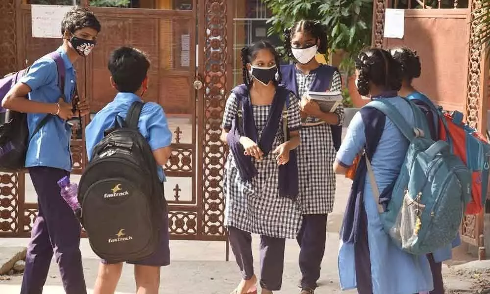 Students heading to the GVMC High School at Prakasaraopeta in Visakhapatnam