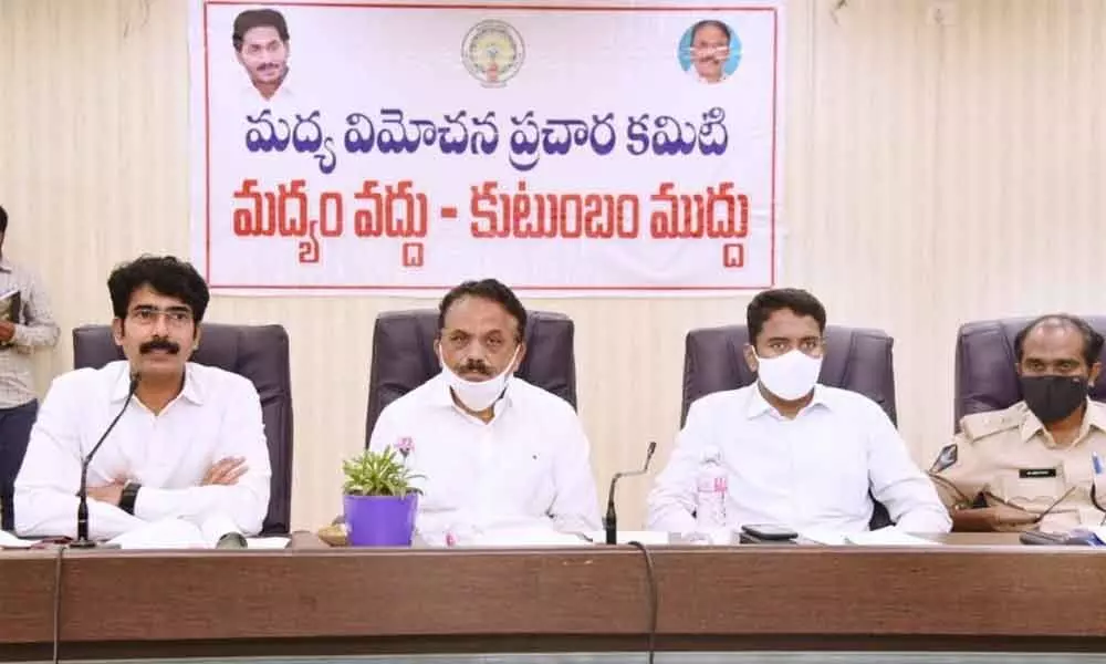 APAC Chairman Vallam Reddy Lakshmana Reddy addressing the officials along with District Collector D Muralidhar Reddy and Joint Collector Dr G Lakshmisha in Kakinada on Saturday