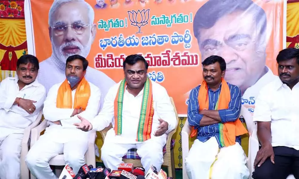BJP leader Babu Mohan addressing media in Tirupati on Monday