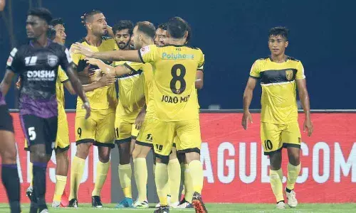 Aridane Santana celebrates with HFC teammates after scoring against OFC in match 4 of ISL 7 at the GMC Athletic Stadium, Bambolim on Monday