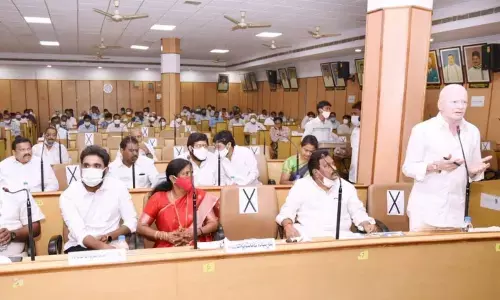 Rajya Sabha Member Pilli Subhash Chandra Bose addressing in DRC meeting at Zilla Parishad Hall, Kakinada on Monday