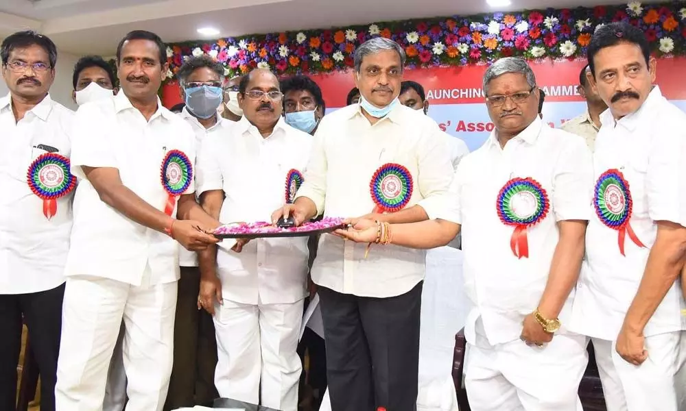 Government Advisor Sajjala Ramakrishna Reddy inaugurating the website of AP NGOs Association in Vijayawada on Tuesday