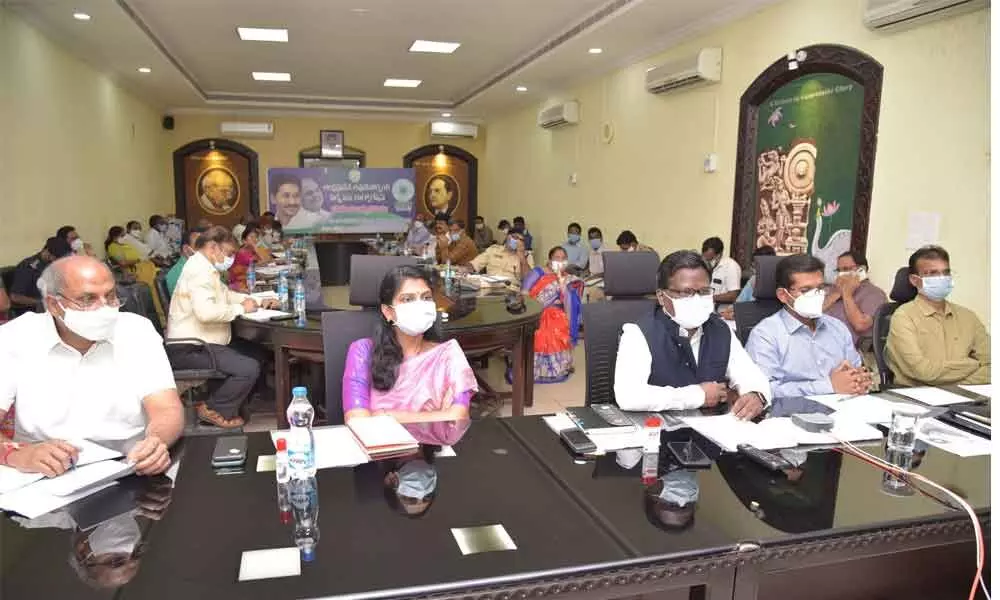 District Collector I Samuel Anand Kumar participating in CMs videoconference from Collectorate in Guntur on Tuesday