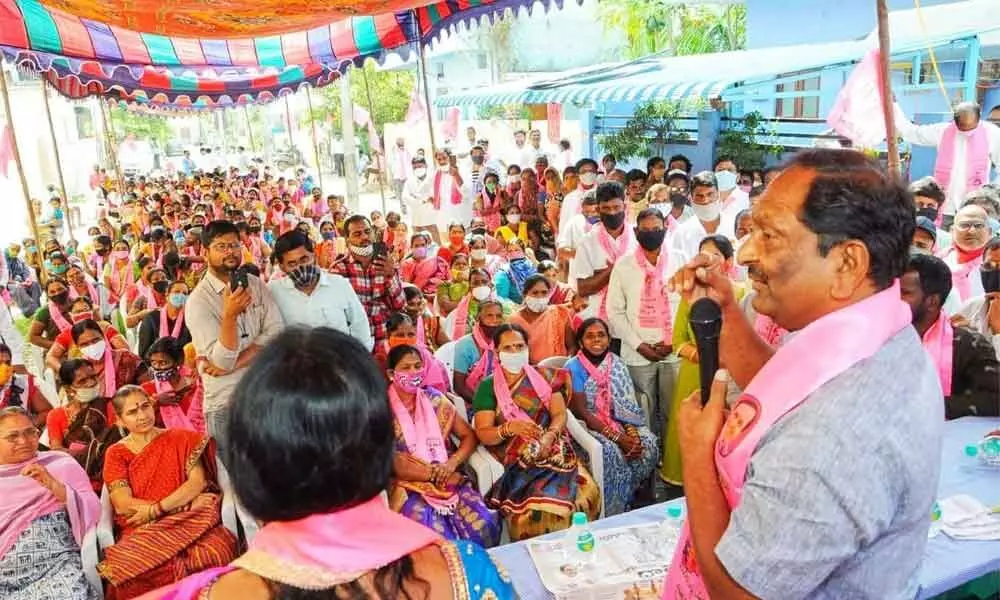Welfare Minister Koppula Eshwar speaking during an election campaign in 137th division in Vinayak Nagar