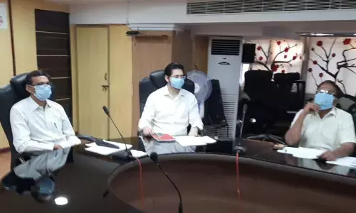 VMRDA Commissioner P Koteswara Rao speaking at a review meeting in Visakhapatnam on Tuesday