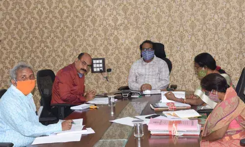 District Collector S Venkat Rao reviewing Dharani portal registrations and paddy procurement at the district Collectorate in Mahbubnagar