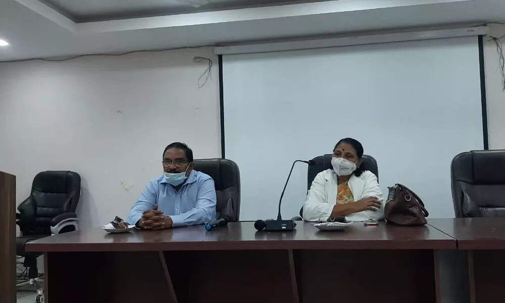 KGH Superintendent Dr P N Jikki accompanied with Deputy Superintendent Dr Bhagawan addressing a meeting at Dhanvanthri Conference Hall in Kurnool on Wednesday
