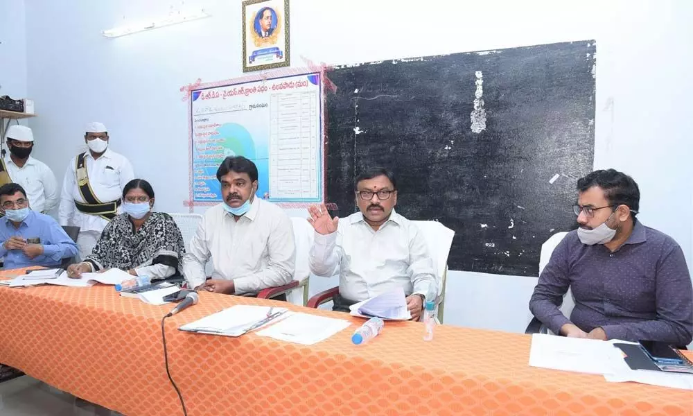 Prakasam District Collector Dr Pola Bhaskara speaking at the Ulavapadu tahsildar office on Wednesday