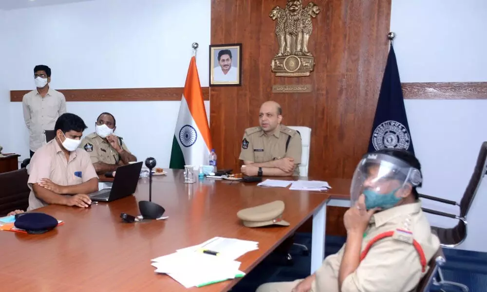 District Superintendent of Police Adnan Nayeem Asmi hosting videoconference with police officials in Kakinada on Wednesday
