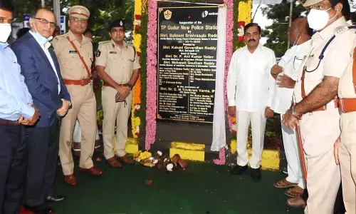 Guntur Range DIG Trivikram Varma and Sarvepalli MLA K Govardhan Reddy inaugurating the new building of model police station in TP Gudur on Wednesday