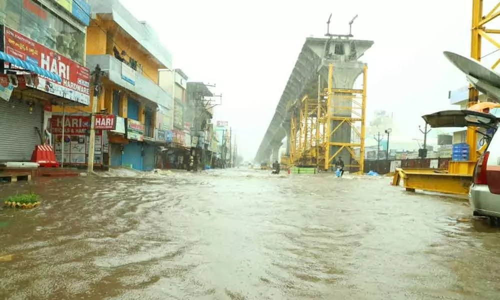 Heavy rain water flowing at karakambadi road tirupati.